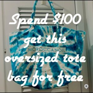 Spend $100 get this free Moroccan Oil oversized beach tote for free